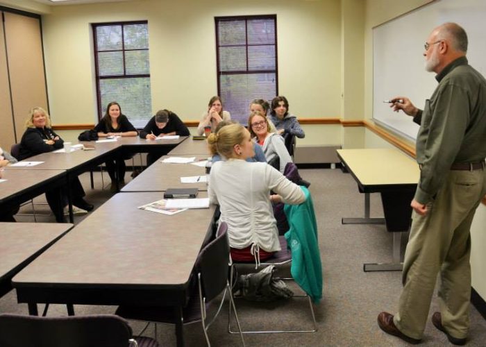 David Jauss leads area high school students through a fiction writing exercise.